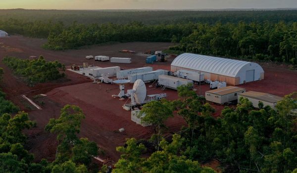 Drone captured photo over a remote site with Container Dome Fabric Structures